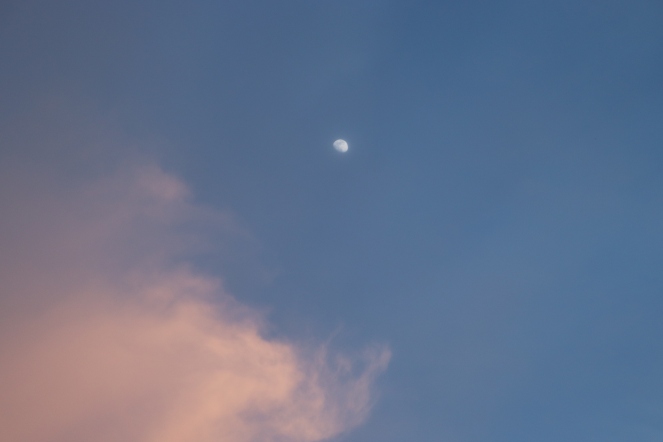 Moon At The Edge of The Clouds