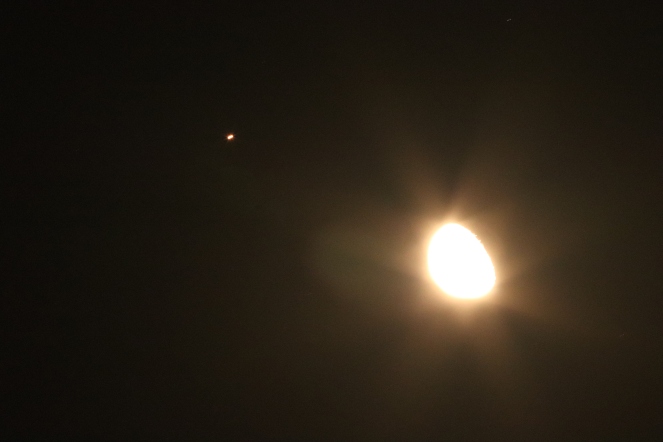 Overexposed Partial Moon With The Streak of Mars